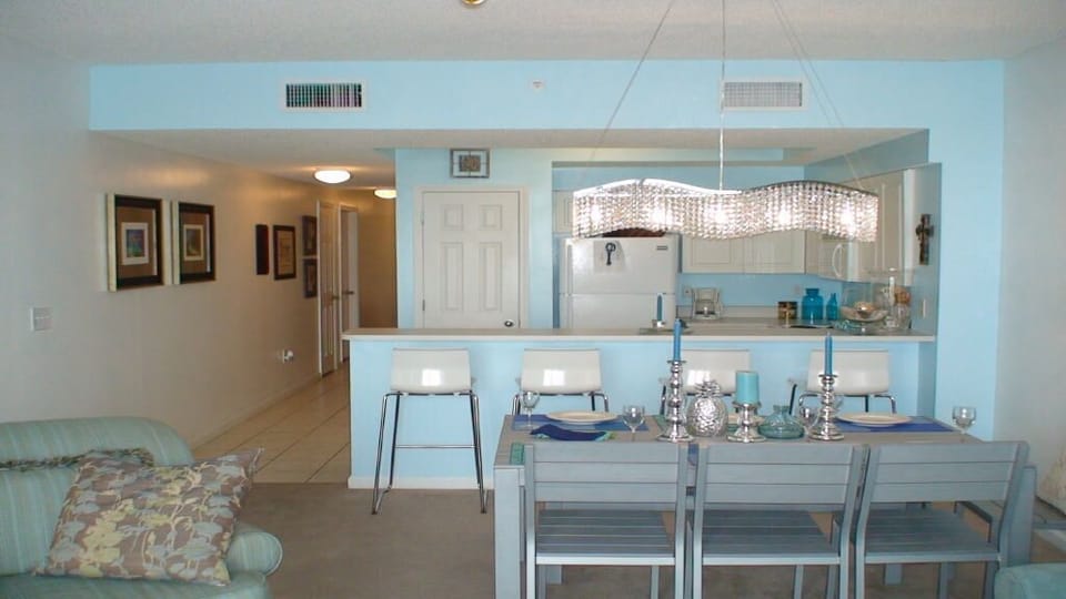 Large table with seating for 6 as well as breakfast bar with seating for 4!