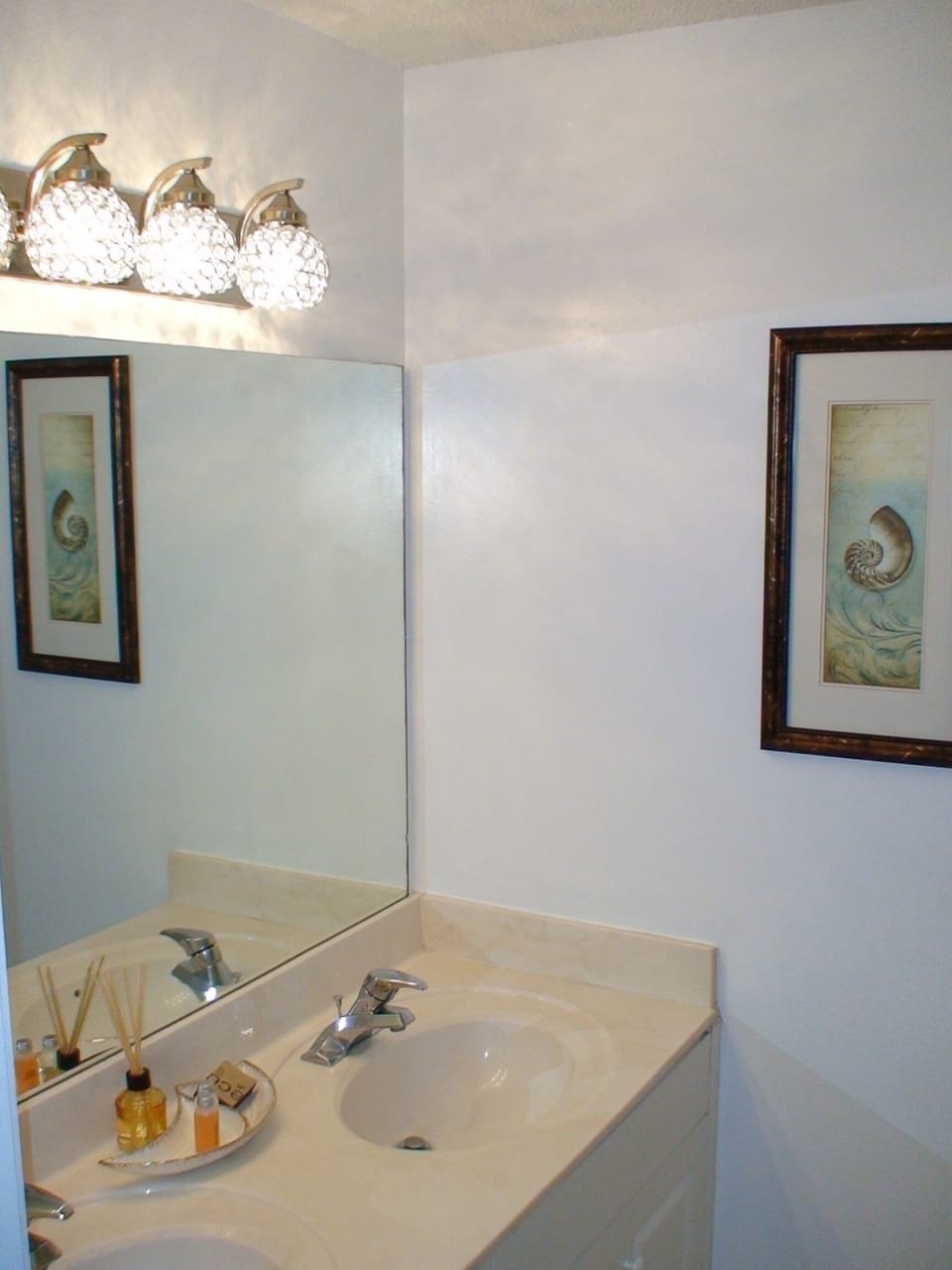 Double vanity master bath. Very clean and well decorated.