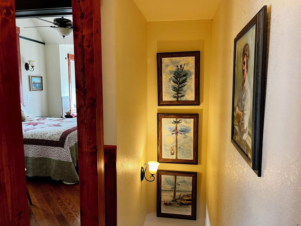 Second Floor Landing
Do you have people sleeping on the futon. The second floor landing has separate doors to the bedroom and bathroom. This allows guests on the futon access to the bathroom without entering the bedroom.