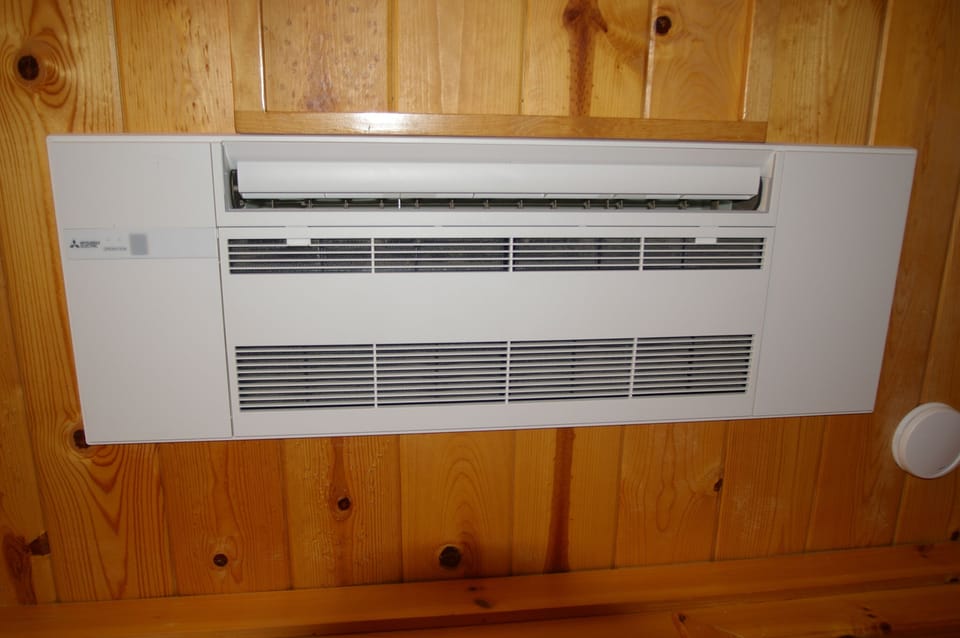 Mitsubishi "silent" air conditioner,  mounted in the ceiling of the bedroom