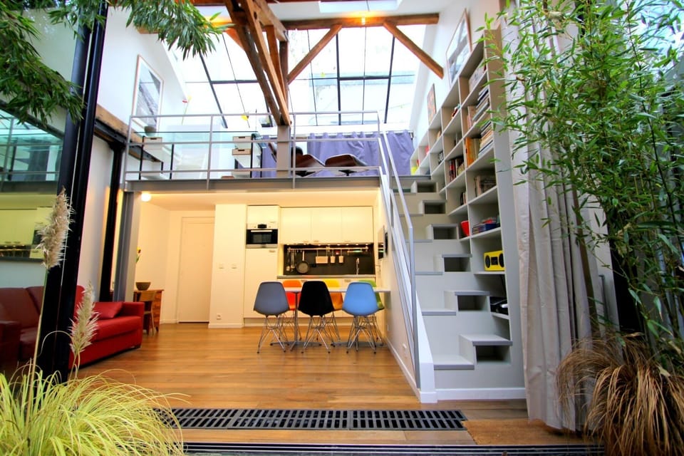 Our incredibly charming duplex loft is ideally located in the Marais
