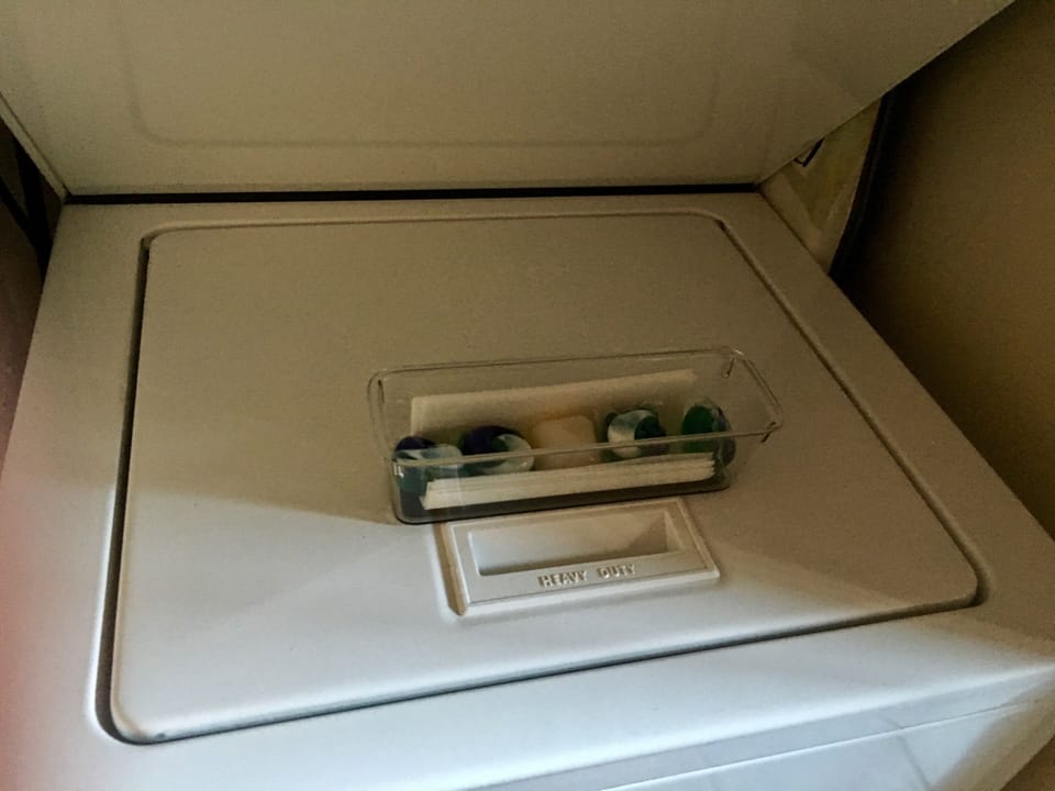 Initial supply of washing pods & dryer sheets provided.