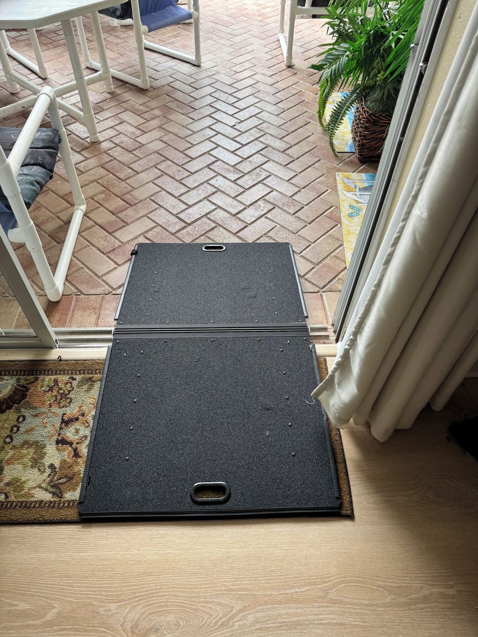Portable Wheelchair/scooter ramp leading to lanai/pool deck available