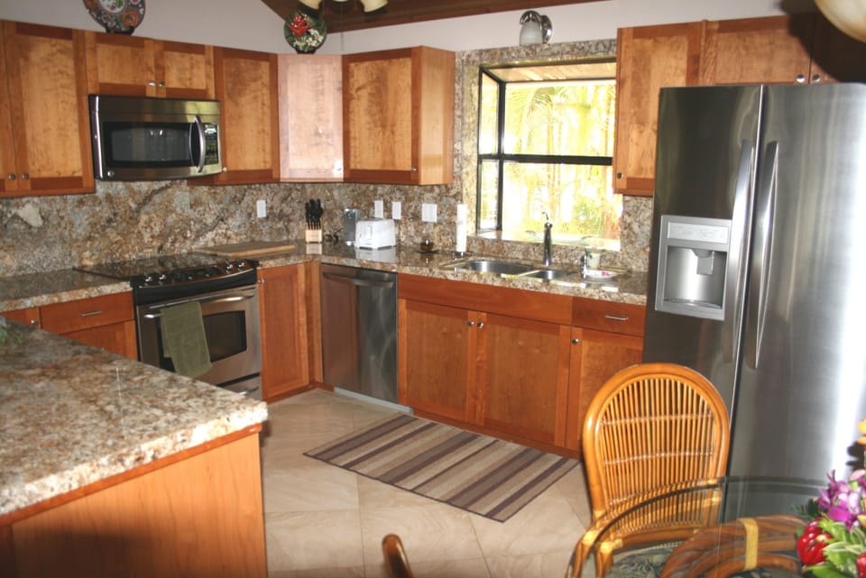 Newley remodeled kitchen with granite counters and new appliances.