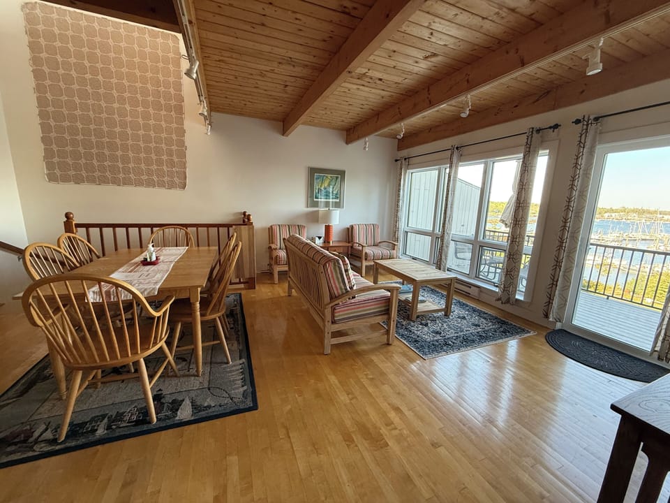 Mid level dining room, living room, outside deck