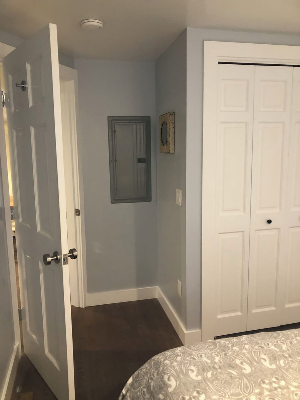 Door to bedroom from open living area