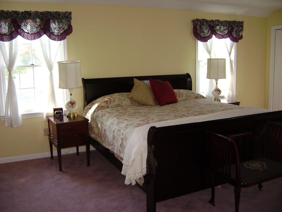 Master Bedroom  with King bed. Steps out to a balcony.