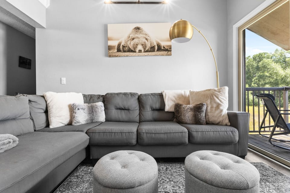 Large & Cozy Couch - Gray Sectional Sofa with decorative pillows + Two light Grey Tufted Storage Ottomans