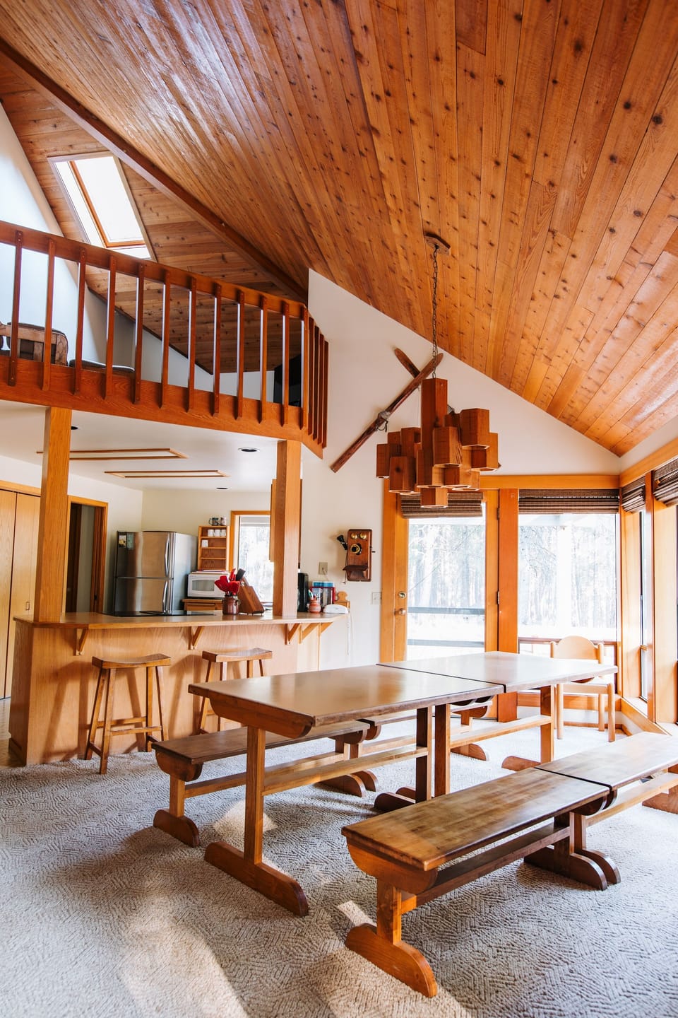Dining room, kitchen and door to the back deck