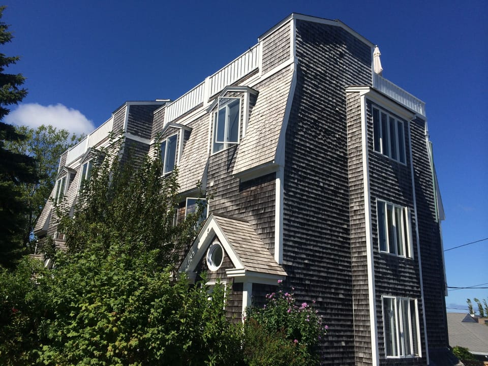 Four-story, beautifully outfitted end unit with private, panoramic roofdeck