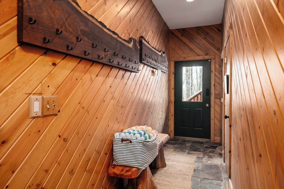 Entrance with storage for ski gear and Towels for hot tub/Shanty Creek Pools