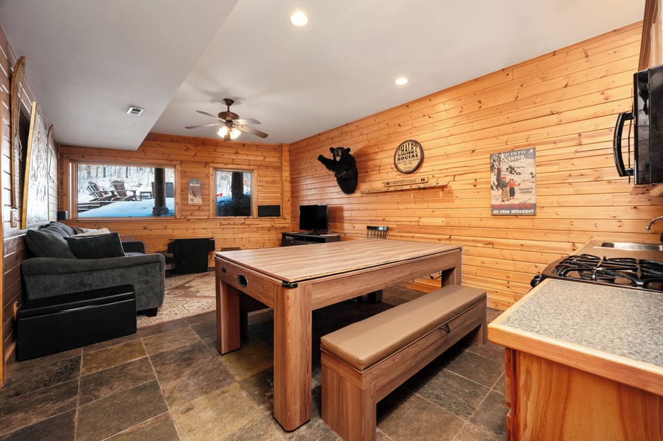 Dining table also functions as air hockey and ping pong table.