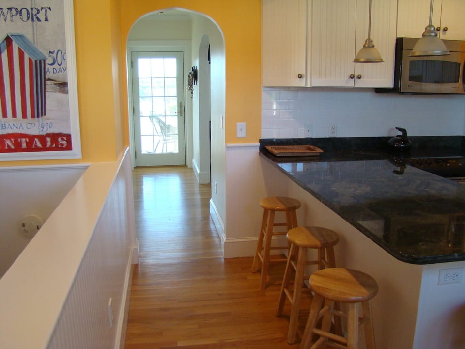 Hall from Kitchen to back porch with views