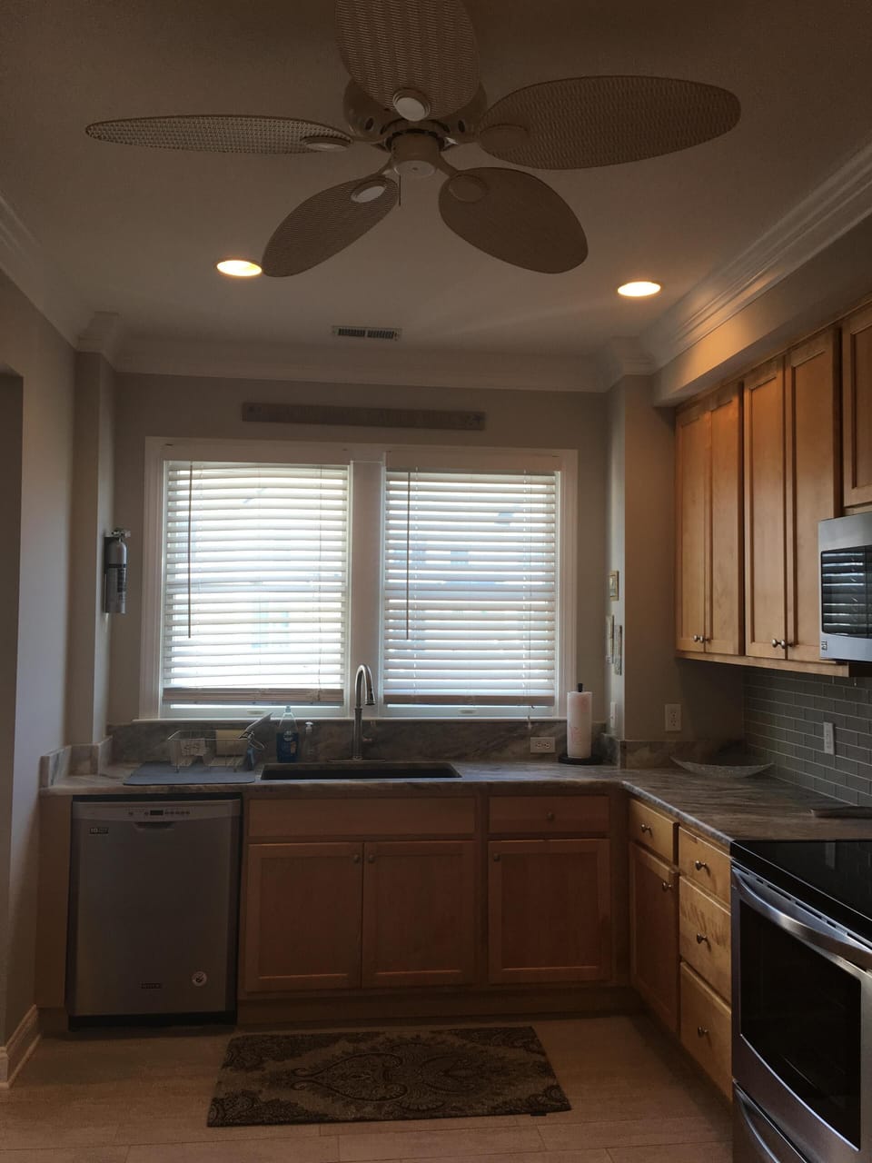 Kitchen windows with ceiling fan 