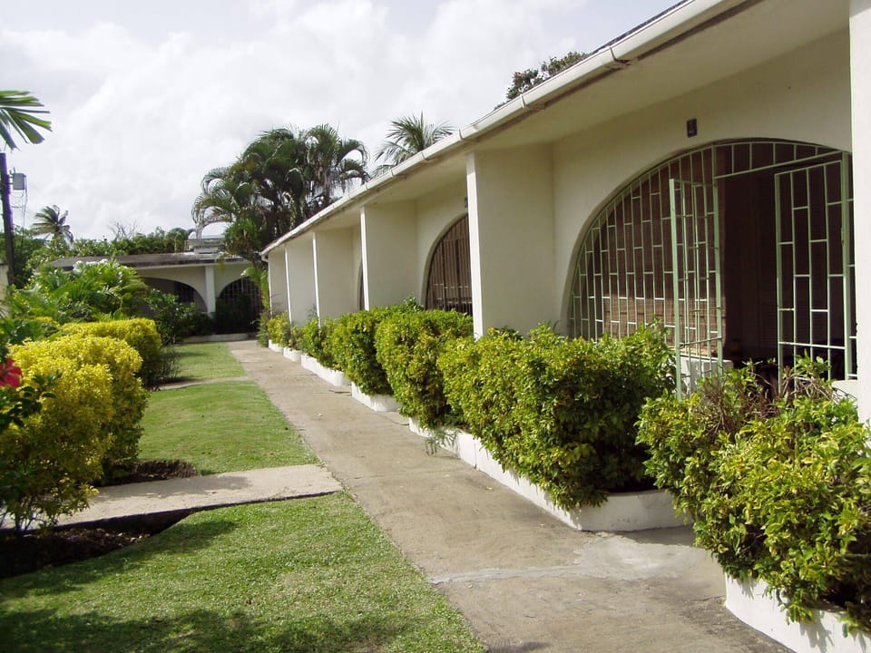 Small garden at front of condo entrance.  When using BBQ, roll out to garden.
