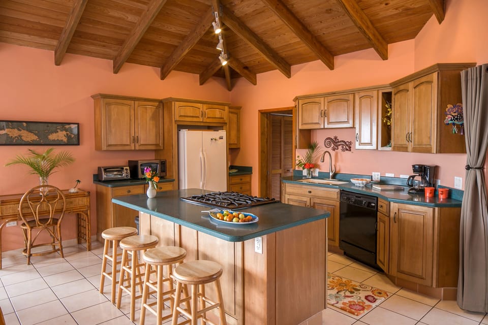 Open concept kitchen to enjoy company while creating your favorite island meal. 