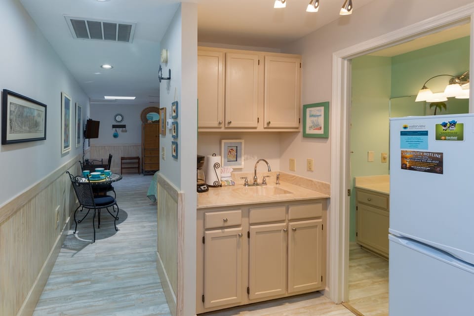 Kitchen bar area is outside the bathroom