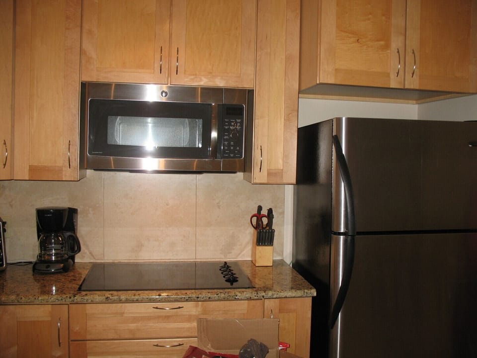 Glass Top Cooking Surface, GE Microwave + Convection Oven, Full Size Refrig!!!