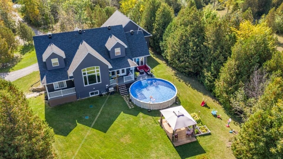 View of our backyard, pool and gazebo