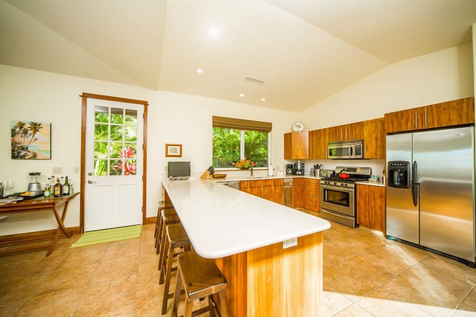 Well Equipped Kitchen with Bar Seating for Four
