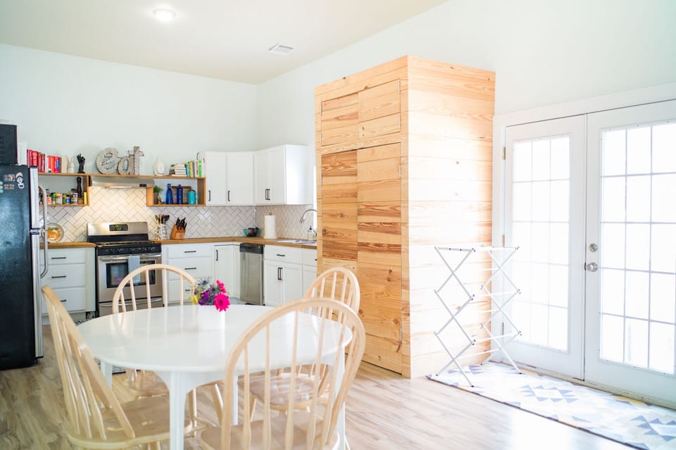 Kitchen and dining area with laundry facilities