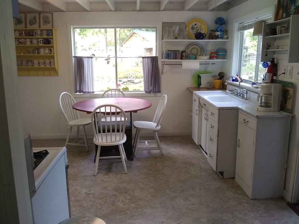 Camp kitchen, beautiful natural sunlight, entry door to the right.