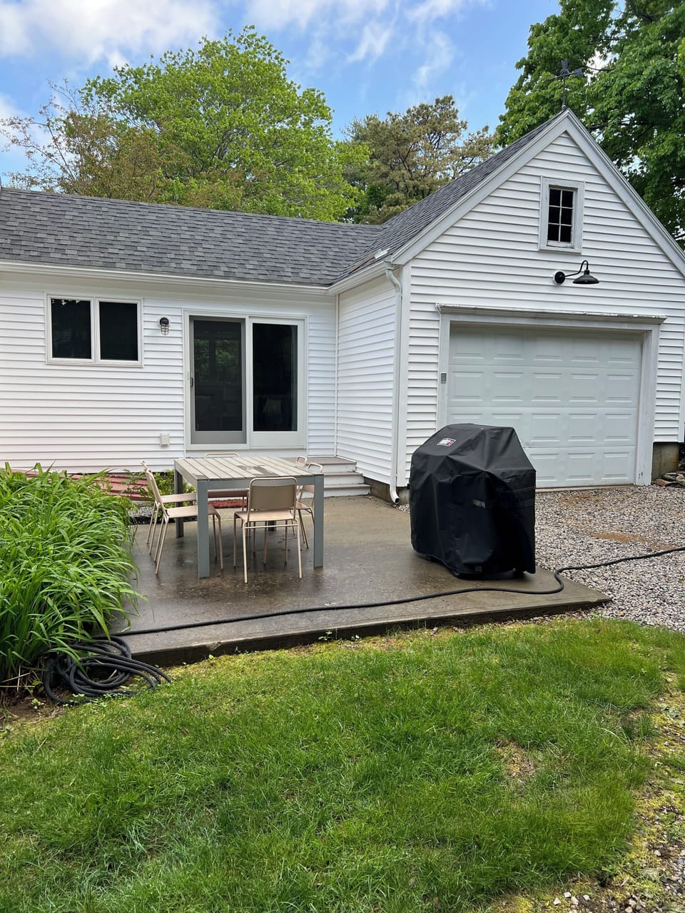 New slider and small deck that connects to protected patio