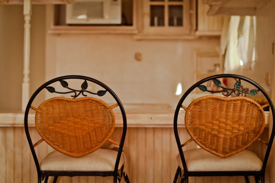 Bar stools at the kitchen counter.