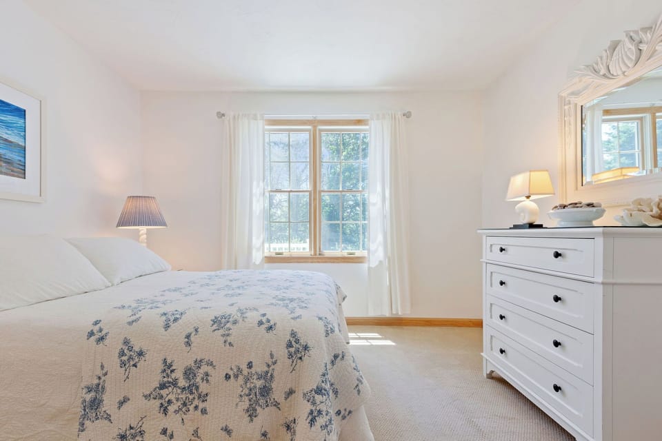 First floor second bedroom with views of backyard conservation area. 