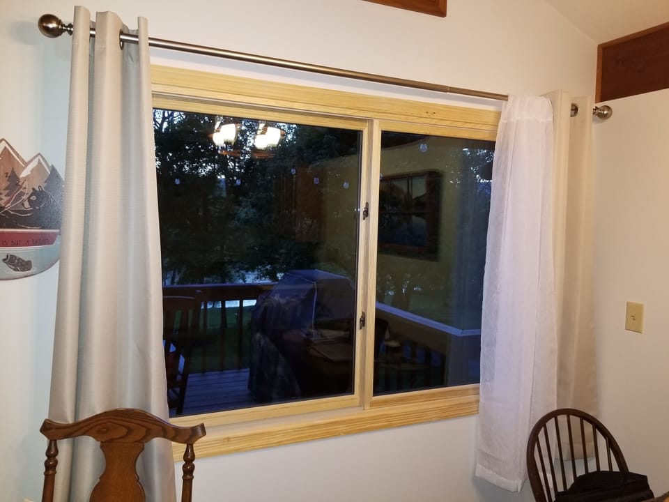 New large panel windows overlooking the deck