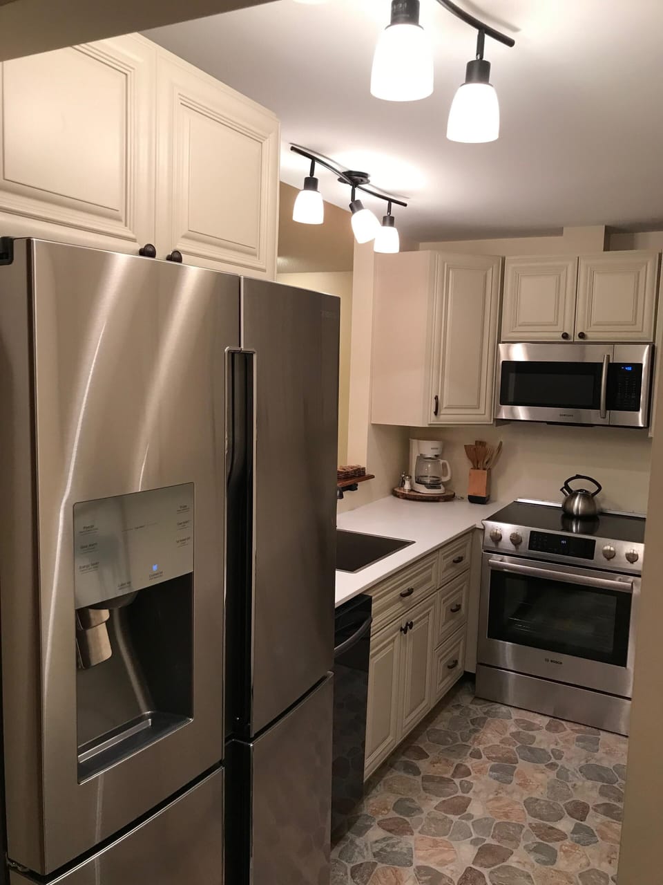 Full Stocked Kitchen with XL Fridge, electric Range, Dishwasher, and Microwave