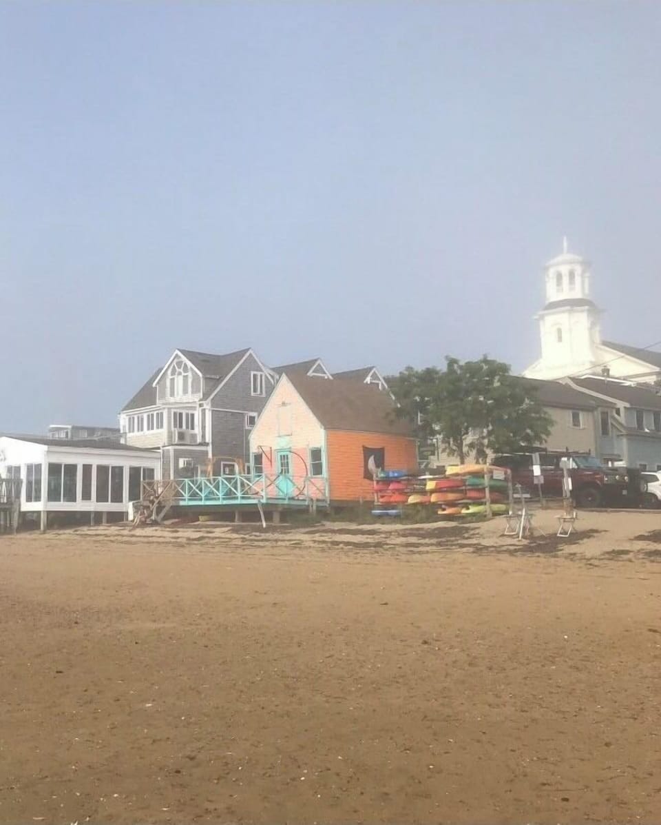 Harbor Lounge in front of condo, and library from beach