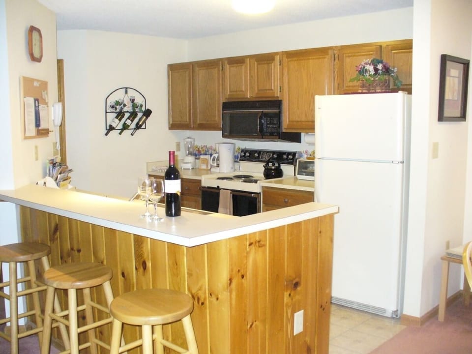 Fully-equipped kitchen including microwave. 