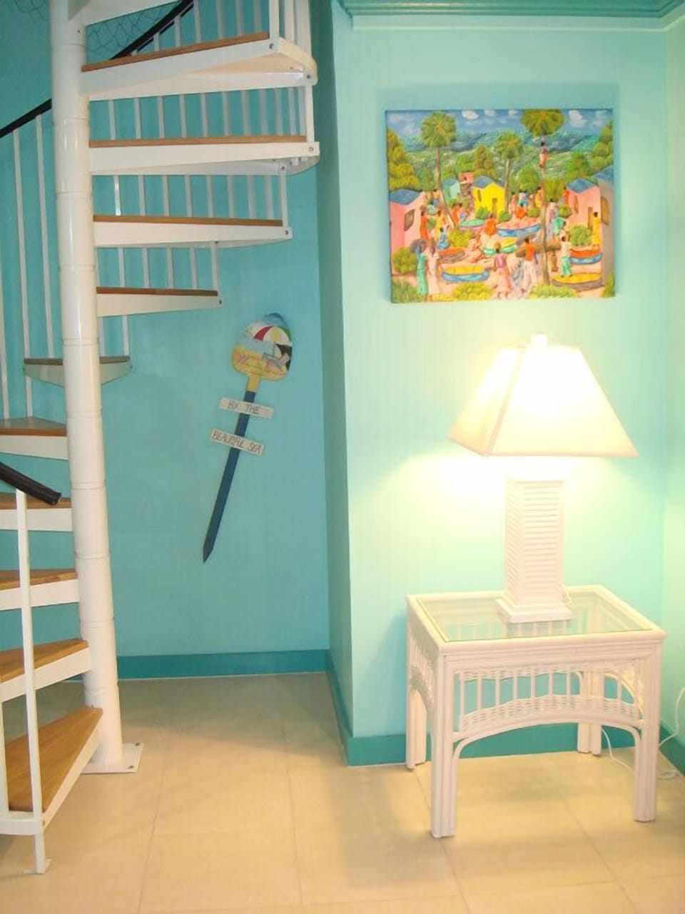 Stairs to bright airy second bedroom and bath