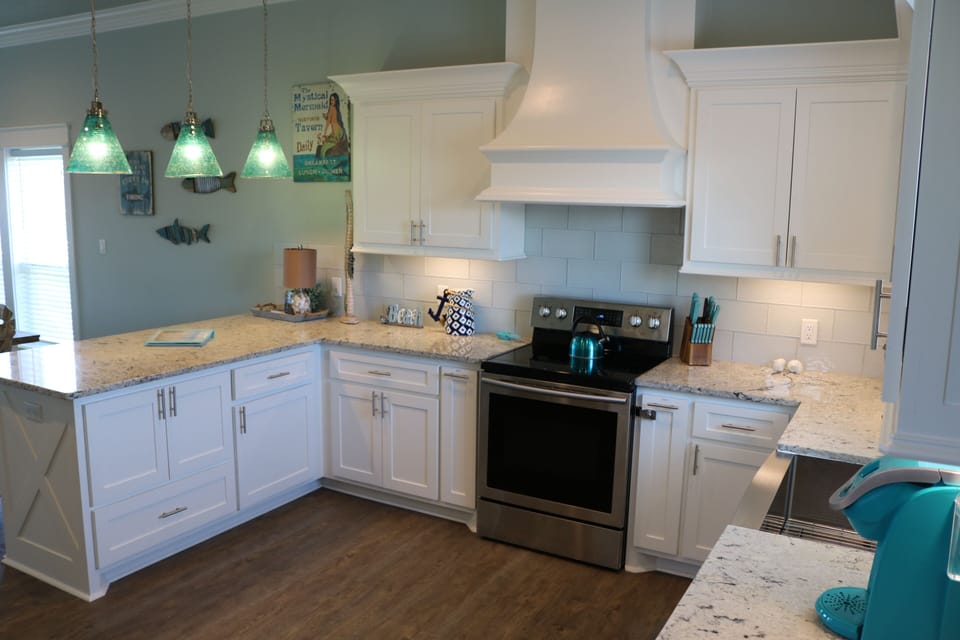 The Kitchen is well-equipped and ready for preparing any variety of meals.