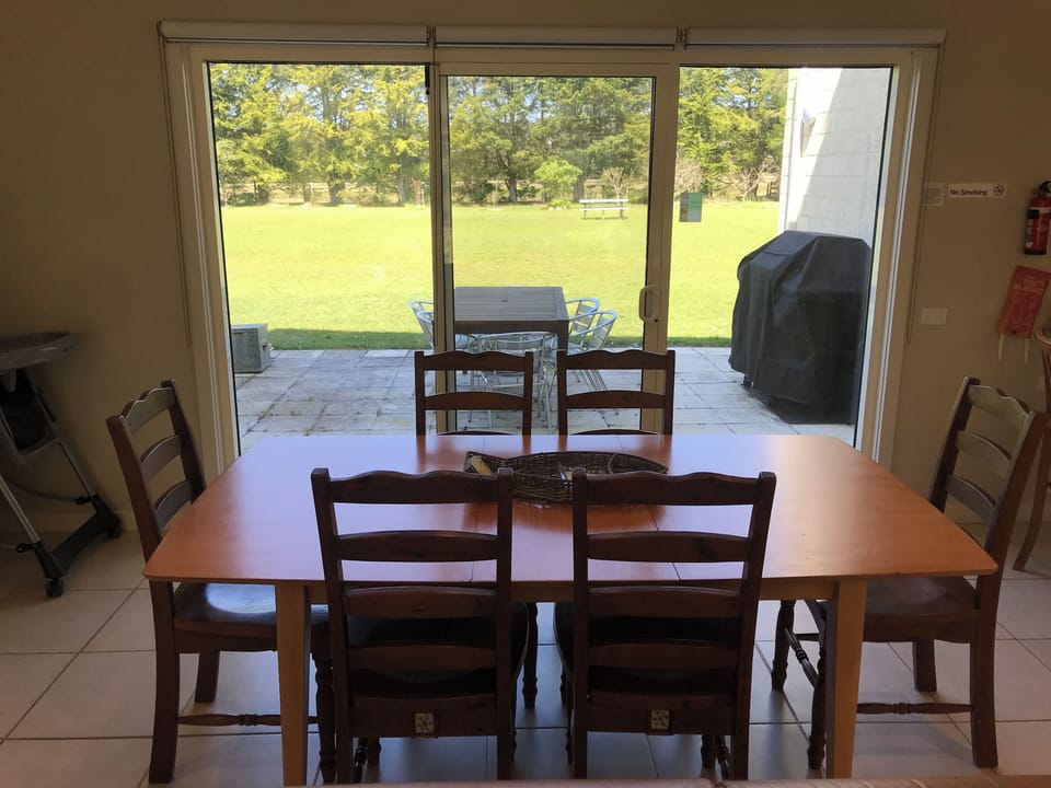 Dining leading to patio and BBQ