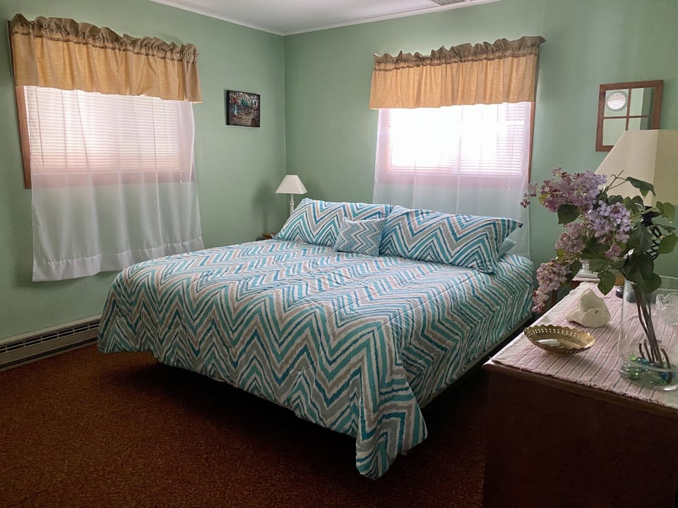 The master bedroom with a king size bed.