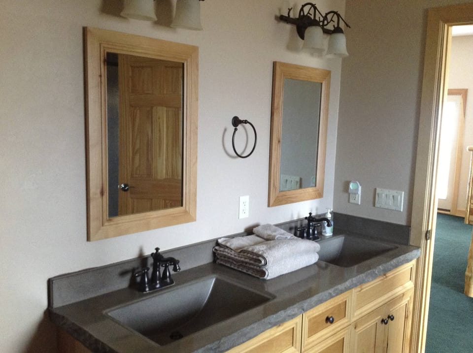 One of the Master King Suite bathrooms. Double sinks.  Double showers.

