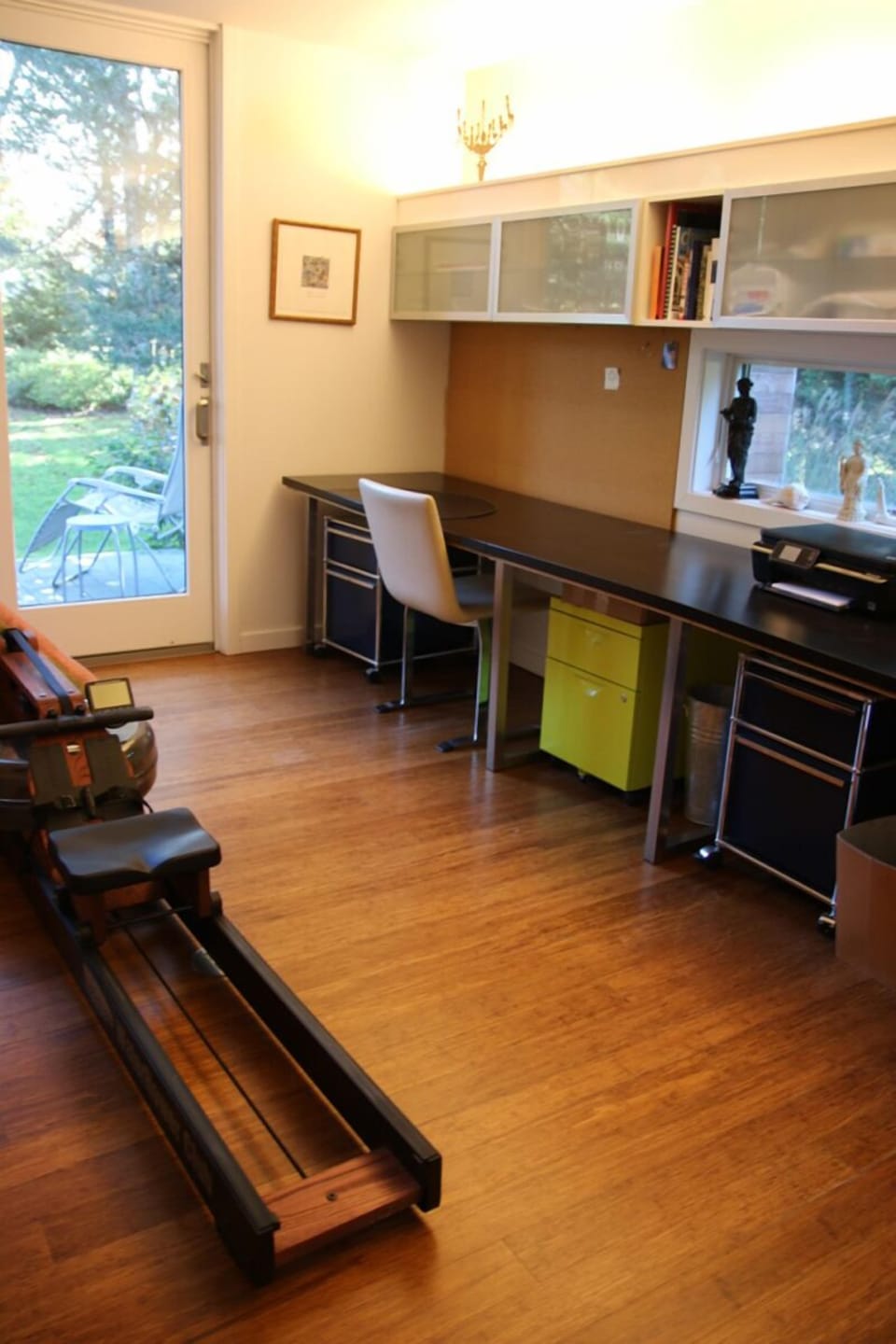 Office w full length desk area and rowing machine!