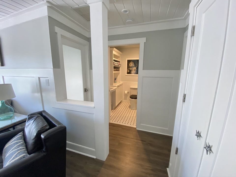 Hall with Bathroom in between the 2 bedrooms