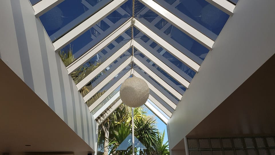 Big glass atrium roof in the living area