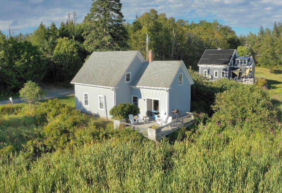 Drone shot of back deck that faces marsh and harbor.