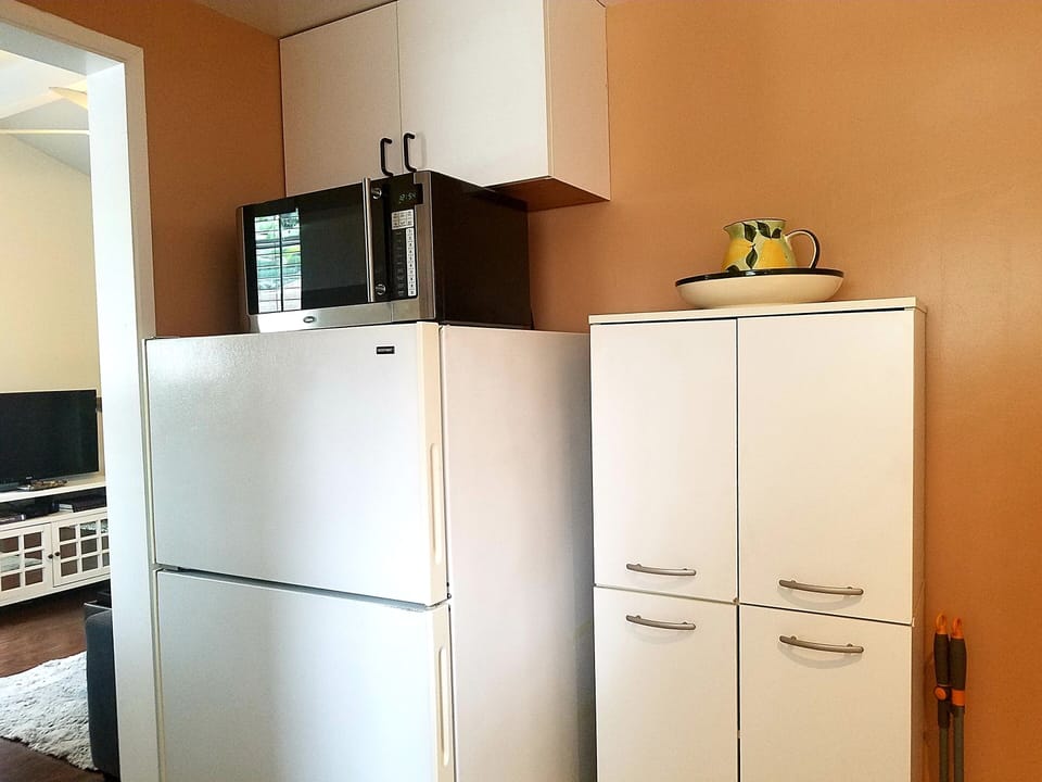 Your kitchen also includes a full refrigerator, microwave and pantry.