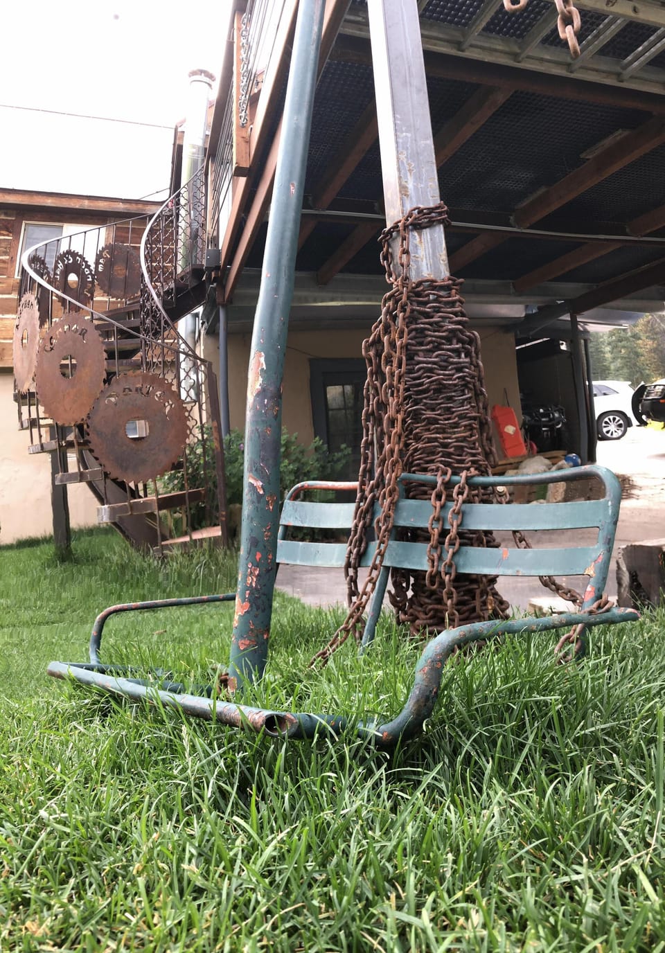 One of the first chair lifts at Brighton Ski resort adorns the yard now!
