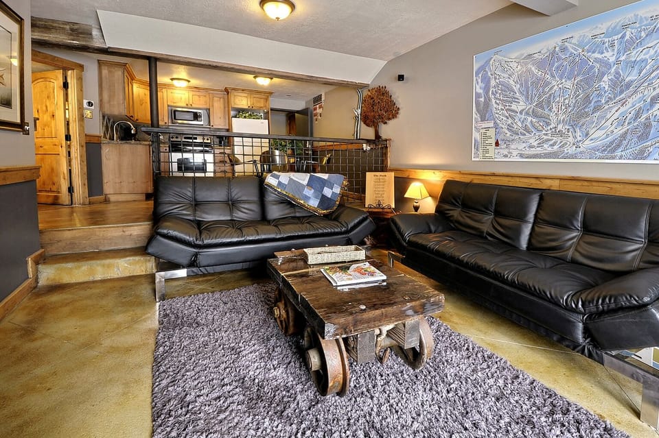 TV room. These couches fold down into comfortable full size beds in seconds. 