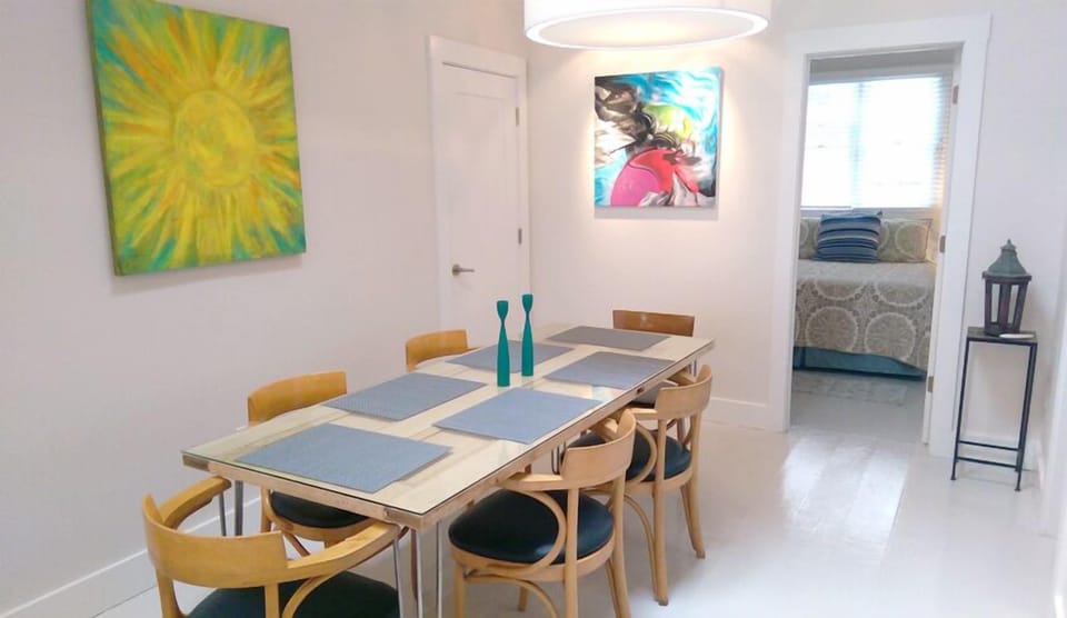 Washer/Dryer room-door behind dining area