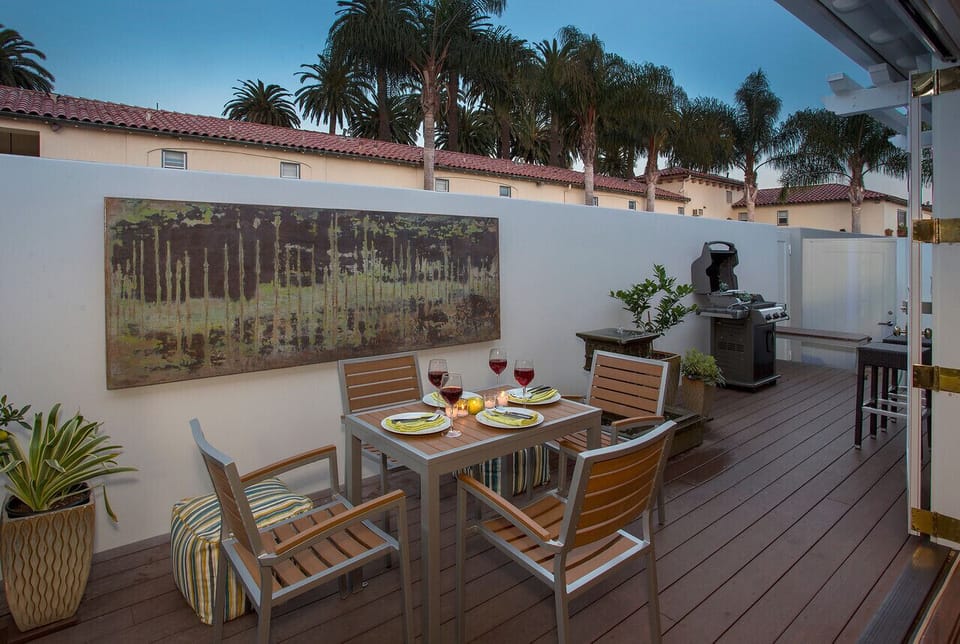 A patio door leads straight to the beach and boardwalk