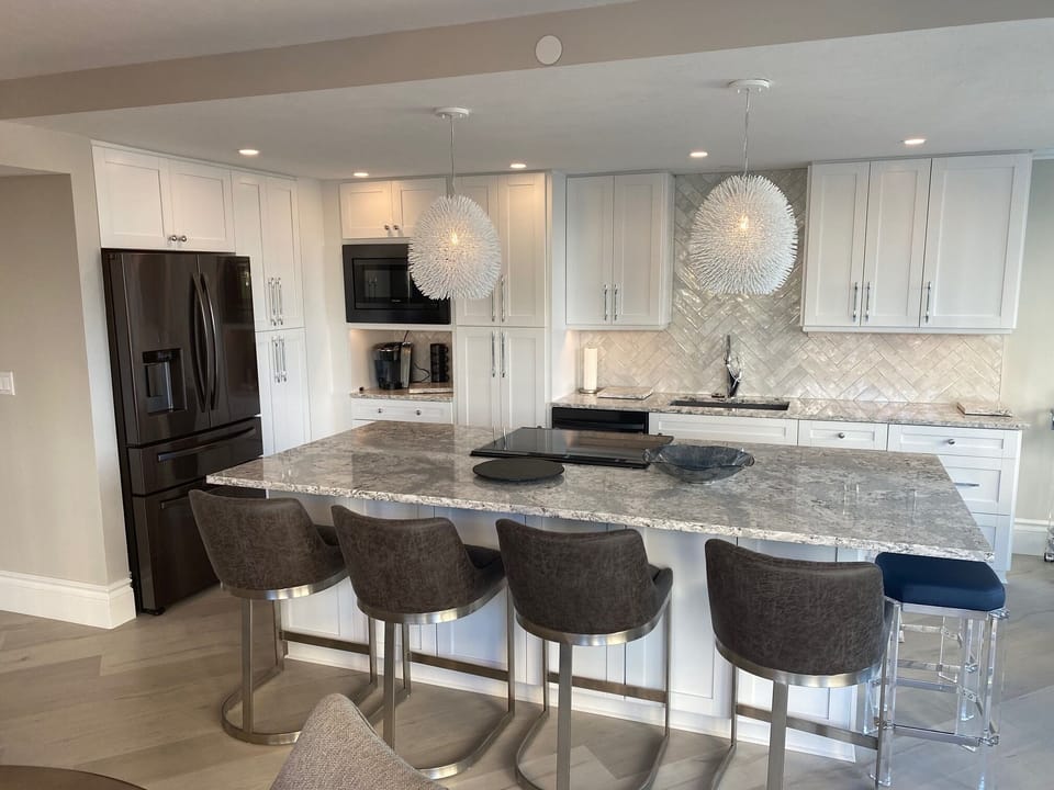 All new black stainless steel appliances