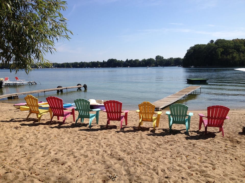 100ft. beach with firm sandy lake bottom. 2 docks, swimming raft, kayaks, 