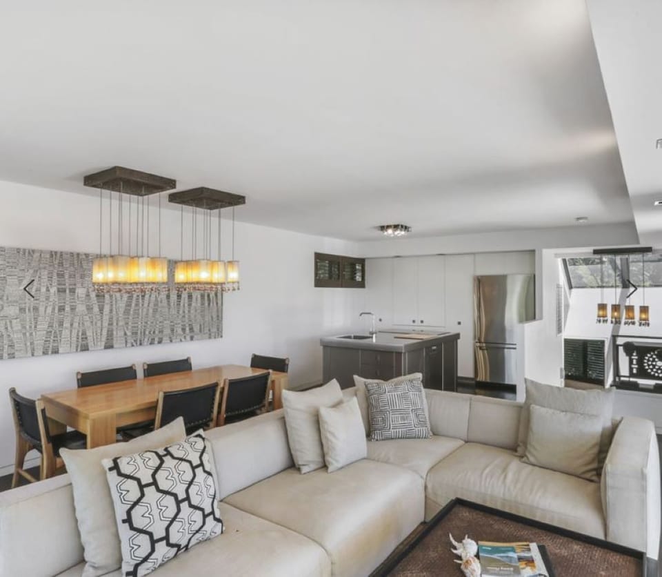 Lounge dining and kitchen areas.